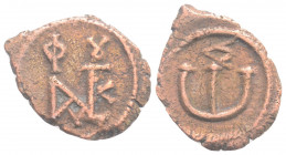 Byzantine
Justin II, (565-578 AD)Constantinople 
AE Pentanummium (17,6mm 1,60g)
Obv: Monogram 
Rev: Large E
 S.363.