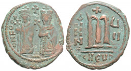 Byzantine
Phocas (602-610 AD) Theoupolis 
AE follis (28mm 9,95g) 
Obv: ONFOCA-NϵPϵAV, Phocas on left and Leontia on right standing facing, Phocas hold...