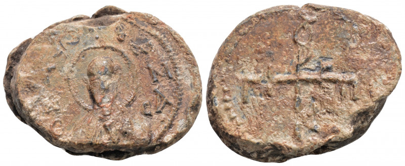 Byzantine Lead Seal ( 8th century)
Obv: Facing bust of uncertain saint.
Rev: Cru...