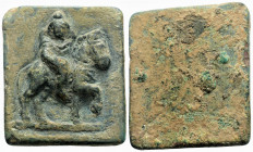 Weights
ASIA MINOR. Uncertain (9-12th century)
AE Bronze, 34x29,4 mm, 25,10 g). 
Obv: Horseman advancing right. 
Rev: Blank.