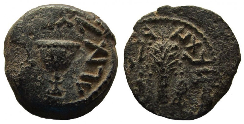 Judaea. First Jewish War, 66-70 AD. AE 1/8 Shekel. Jerusalem mint.


22 mm.
...