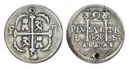 2 REALES. Caracas. 1820-BS. Castillos y leones. "1" de la fecha invert. Golpe de punzón en anv (6h), sin adornos en rev. XC-847 (Vte.). 5,16 g. RARA. ...