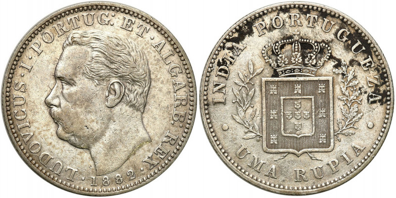 Portugal
Portuguese India. 1 rupee 1882 

Patyna.KM 11

Details: 11,61 g Ag...