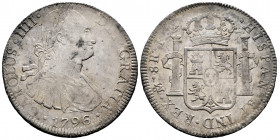 Charles IV (1788-1808). 8 reales. 1796. Mexico. FM. (Cal-959). 26,92 g. Choice VF. Est...50,00. 

Spanish description: Carlos IV (1788-1808). 8 real...