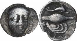 Greek Italy. Central and Southern Campania, Phistelia. AR Obol, 325-275 BC. Obv. Male head facing slightly right. Rev. Dolphin, grain of barley, musse...
