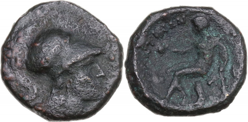 Greek Italy. Southern Apulia, Tarentum. AE 18 mm, c. 280 BC. Obv. Helmeted head ...