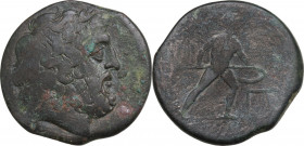 Greek Italy. Bruttium, The Brettii. AE 26 mm. c. 211-208 BC. Obv. Laureate head of Zeus right. Rev. Warrior advancing right, holding spear and large s...