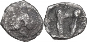 Sicily. Himera. AR Hemilitra, 470-450 BC. Obv. Head of warrior left, helmeted. Rev. Pair of greaves. HGC 2 445. AR. 0.80 g. 10.00 mm. R. About VF/Good...