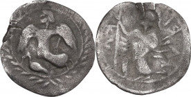 Sicily. Kamarina. AR Litra, 460-435 BC. Obv. Nike flying left; below, swan; all within wreath. Rev. Athena standing left, holding spear and shield. HG...