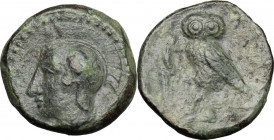 Sicily. Kamarina. AE Tetras, c. 410 BC. Obv. Head of Athena left, helmeted. Rev. Owl standing left, grasping lizard; in exergue, three pellets. CNS II...