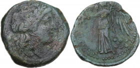 Sicily. Messana. The Mamertinoi. AE Hemilitron, c. 241-220 BC. Obv. Laureate head of Apollo right; lyre behind. Rev. Nike standing left, holding wreat...