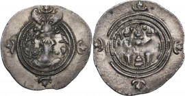 Greek Asia. Sasanian Kings. Khusro II (591-628). AR Drachm. Unclear mint, unclear year (before year 11). Obv. Bust of Khusro II right, wearing winged ...