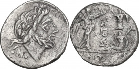 T. Cloulius. AR Quinarius, 98 BC. Obv. Laureate head of Jupiter right. Rev. Victory standing right, crowning trophy; before trophy, captive; beside tr...