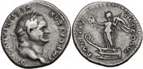 Vespasian (69 -79). AR Denarius. Obv. Laureate head right. Rev. Victory, holding wreath and palm frond, standing left on prow. RIC II-p. 1 (2nd ed.) 7...