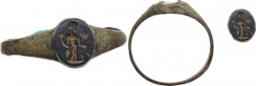Bronze ring with stone bearing a seal depicting a standing female figure holding cornucopia and patera; to right, altar; in field, star. Roman. Inner ...