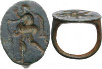 Bronze seal ring depicting an advancing figure raising one hand and holding walking stick with the other. Roman. Iner diameter: 17 mm.