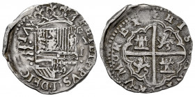 Philip II (1556-1598). 1 real. Valladolid. A. (Cal-296). Ag. 3,35 g. 3 tatters to the left of the shield. Letter "A" without crossbar. Arms of Flander...