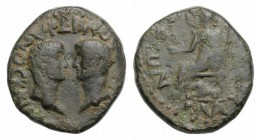 Titus and Domitian (Caesares, 69-81). Lycaonia, Laodicea Combusta. Æ (17mm, 4.85g, 6h). Confronted bare heads of Titus and Domitian. R/ Cybele seated ...