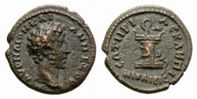 Marcus Aurelius (160-180). Bithynia, Nicaea. Æ (18mm, 3.72g, 6h). M AVPHΛION KAI […], Bare head r. R/ CΩTHPI ACKΛGΠI NIKAIEIC, Serpent entwined altar....