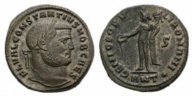 Constantius I (Caesar, 293-305). Æ Follis (26mm, 10.28g, 11h). Antioch, c. 302-3. Laureate head r. R/ Genius standing l., holding patera and cornucopi...