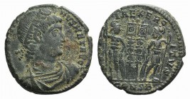 Constantine I (307/310-337). Æ Follis (17mm, 2.42g, 6h). Constantinople, 330-3. Rosette-diademed, draped and cuirassed bust r. R/ Two soldiers flankin...