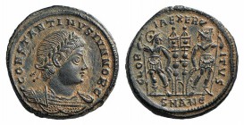 Constantine II (Caesar, 316-337). Æ Follis (16mm, 2.29g, 6h). Antioch, 330-333/35. Laureate and cuirassed bust r. R/ Two signa between two soldiers, e...