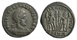 Constantius II (Caesar, 324-337). Æ (18mm, 2.57g, 5h). Antioch, 330-5. Laureate and cuirassed bust r. R/ Two soldiers flanking two standards; SMANZ. R...