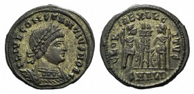 Constantius II (337-361). Æ (18mm, 2.50g, 12h). Alexandria. Laureate and cuirassed bust r. R/ Two soldiers standing to either side of two standards; S...