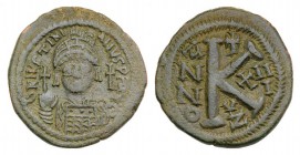 Justinian I (527-565). Æ 20 Nummi (30mm, 11.33g, 12h). Cyzicus, year 13 (538/9). Helmeted and cuirassed bust facing, holding globus cruciger and shiel...