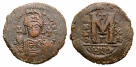 Justinian I (527-565). Æ 40 Nummi (37mm, 20.17g, 6h). Antioch, year 22 (548/9). Facing helmed and cuirassed bust, holding globus cruiciger. R/ Large M...