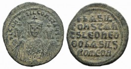 Basil I with Constantine and Leo VI (867-886). Æ 40 Nummi (28mm, 8.50g, 6h). Constantinople, 870-879. Crowned facing half-length figures of Basil, wea...