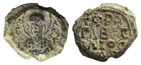 Byzantine Pb Seal, c. 7th-12th century (15mm, 3.67g, 6h). Facing bust of St. Basil, nimbate. R/ CΦPA ΓI BAC IΛIOC in three lines. VF