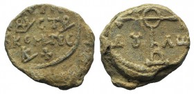 Byzantine Pb Seal, c. 7th-12th century (25mm, 11.61g, 12h). Legend in four lines. R/ Cruciform monogram. VF