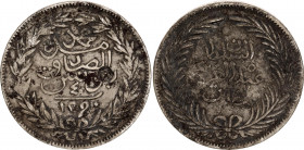 Tunisia 1 Rial 1878 AH 1290 Countermarked
KM# 146; N# 112894; Silver; Abdulhamid II & Muhammad III; VF Toned