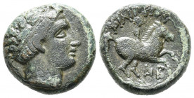 REYES DE MACEDONIA, Filipo II. Ae16. (Ae. 5,54g/16mm). 323-315 a.C. Macedonia. (SNG Ans 905). Anv: Cabeza laureada de Apolo a derecha. Rev: Jinete sob...