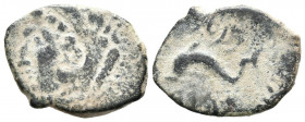 GADES (Cádiz). Sextante. (Ae. 1,76g/18mm). 100-20 a.C. (FAB-1357). Anv: Cabeza de Melkart a izquierda detrás clava. Rev: Delfín a izquierda entre leye...