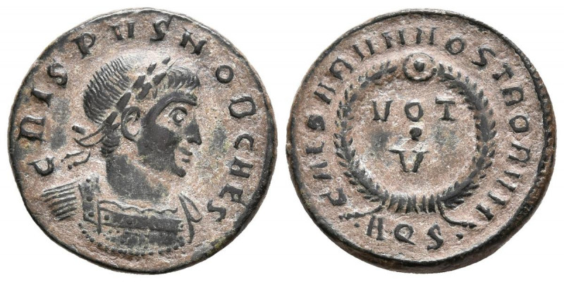 CRISPO. Follis. (Ae. 3,09g/18mm). 321 d.C. Aquileia. (RIC 87). Anv: Busto laurea...