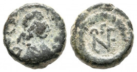 ANASTASIO I. Nummus. (Ae. 1,40g/11mm). 491-198 d.C. Roma. (Seaby 29). Anv: Busto de Anastasio I a derecha. Rev: Monograma de Anastasio I. MBC-.