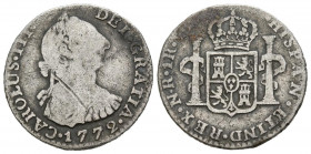 CARLOS III (1759-1788). 1 Real. (Ar. 3,22g/20mm). 1772. Nuevo Reino VJ. (Cal-2019-500). BC+. Raya en anverso. Raro ejemplar.