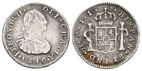 FERNANDO VII (1808-1833). 1/2 Real (Ar. 1,63g/16mm). 1810. Popayán JF. (Cal-2019-427). Moneda tipo. Busto de Carlos IV. MBC. Bonito ejemplar. Rara.