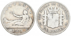 GOBIERNO PROVISIONAL (1868-1871). 1 Peseta. (Ar. 4,73g/23mm). 1869 *18-69. Madrid SNM. (Cal-2019-17). Leyenda: ESPAÑA. BC. Escasa