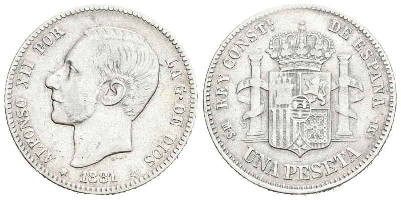 ALFONSO XII (1874-1885). 1 Peseta. (Ar. 4,97/23mm). 1881 *18-81. Madrid MSM. (Ca...