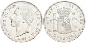 ALFONSO XII (1874-1885). 5 Pesetas. (Ar. 24,87g/37mm). 1885 *18-87. Madrid MPM. (Cal-2019-63). Acuñada bajo el reinado de Alfonso XIII. MBC+.