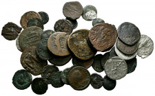 Conjunto de 44 monedas antiguas en su gran mayoría de bronce de distintas cecas íberas y emperadores romanos. A EXAMINAR.