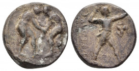 PAMPHYLIA, Aspendos. 420-370 BC. AR Stater. 10.4gr. 21.7mm
Two wrestlers engaged / Slinger standing, triskeles in front, all in dotted square.