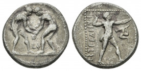 PAMPHYLIA, Aspendos. 420-370 BC. AR Stater. 10.5gr. 22.1mm.
Two wrestlers engaged / Slinger standing, triskeles in front, all in dotted square.