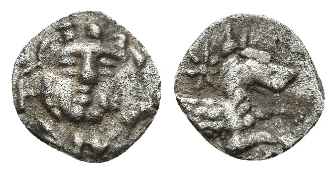 ASIA MINOR, Uncertain. 5th century BC. AR 0.69gr. 9.9mm.
Gorgoneion / Forepart ...