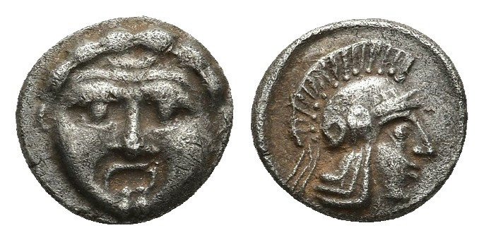 Pisidia, Selge AR Obol. 350-300 BC. 0.97gr. 10.1mm.
Facing gorgoneion / Helmete...