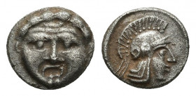 Pisidia, Selge AR Obol. 350-300 BC. 0.97gr. 10.1mm.
Facing gorgoneion / Helmeted head of Athena right.