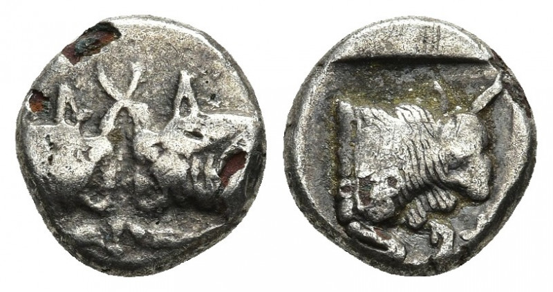 CARIA. Uncertain. Diobol (Circa 480-450 BC). 1.71gr. 11.7mm.
Obv: Confronted fo...